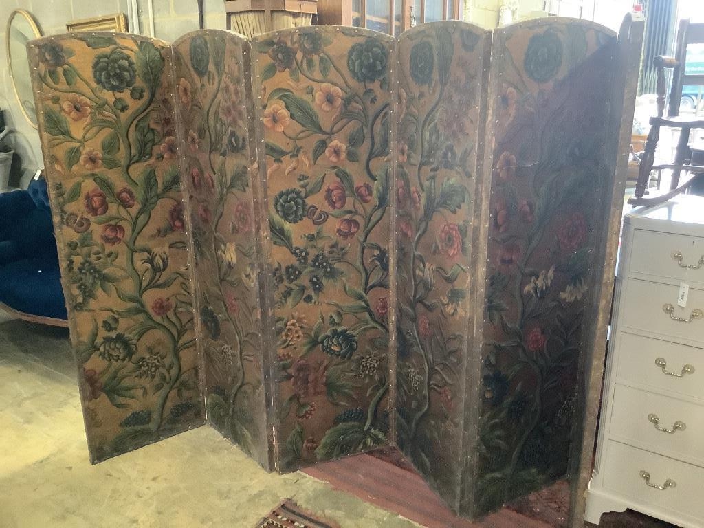 A Spanish leather folding six panel draught screen, with embossed floral printed card panels, height 168cm